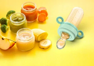 Hryzátko Neno na kŕmenie krmivom, plast, silikón, odtiene zelenej
