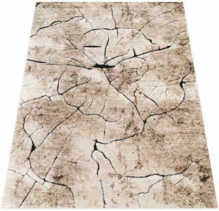 Moderný béžový koberec s motívom stromového pňa 120x180cm